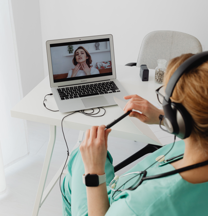 Nurses confidently managing their licenses and career planning on computers